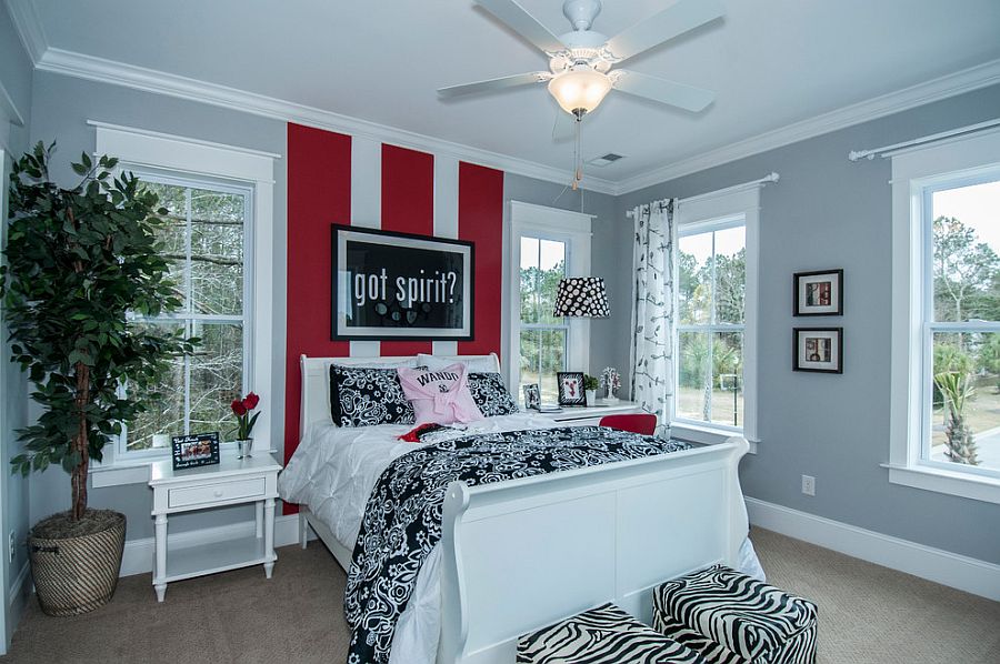 Современный дизайн спальной комнаты с полосатым акцентом стены от FrontDoor Communities