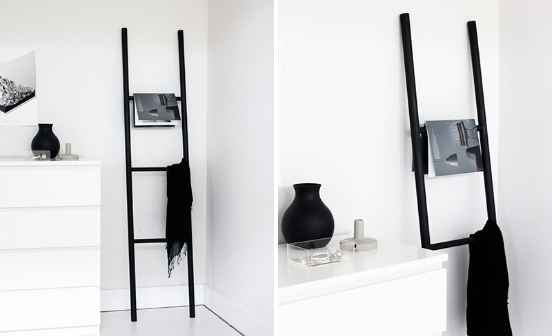 Дизайн комнаты для гостей - чёрная стойка для вещей