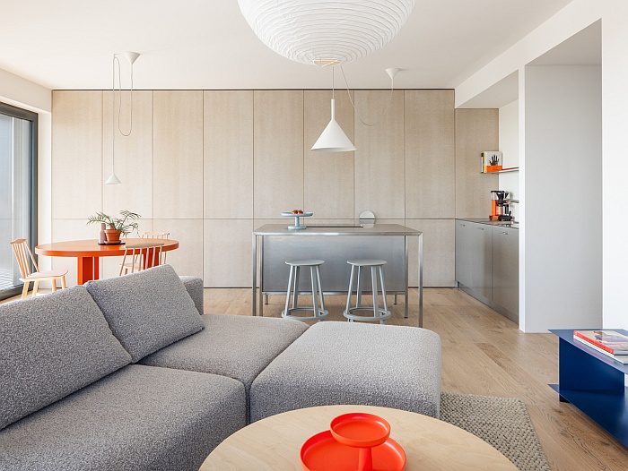 Пастельная гармония с ярким акцентом: уютный дом от Grau Architects