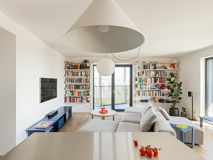 Пастельная гармония с ярким акцентом: уютный дом от Grau Architects