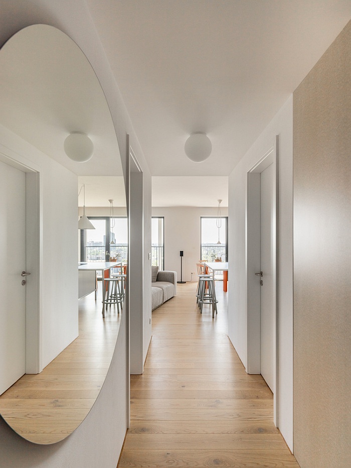 Пастельная гармония с ярким акцентом: уютный дом от Grau Architects