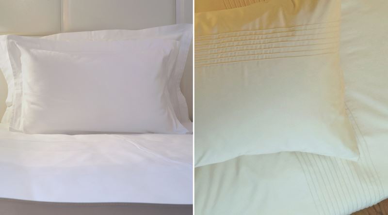 Натуральные постельные принадлежности белого цвета с декором